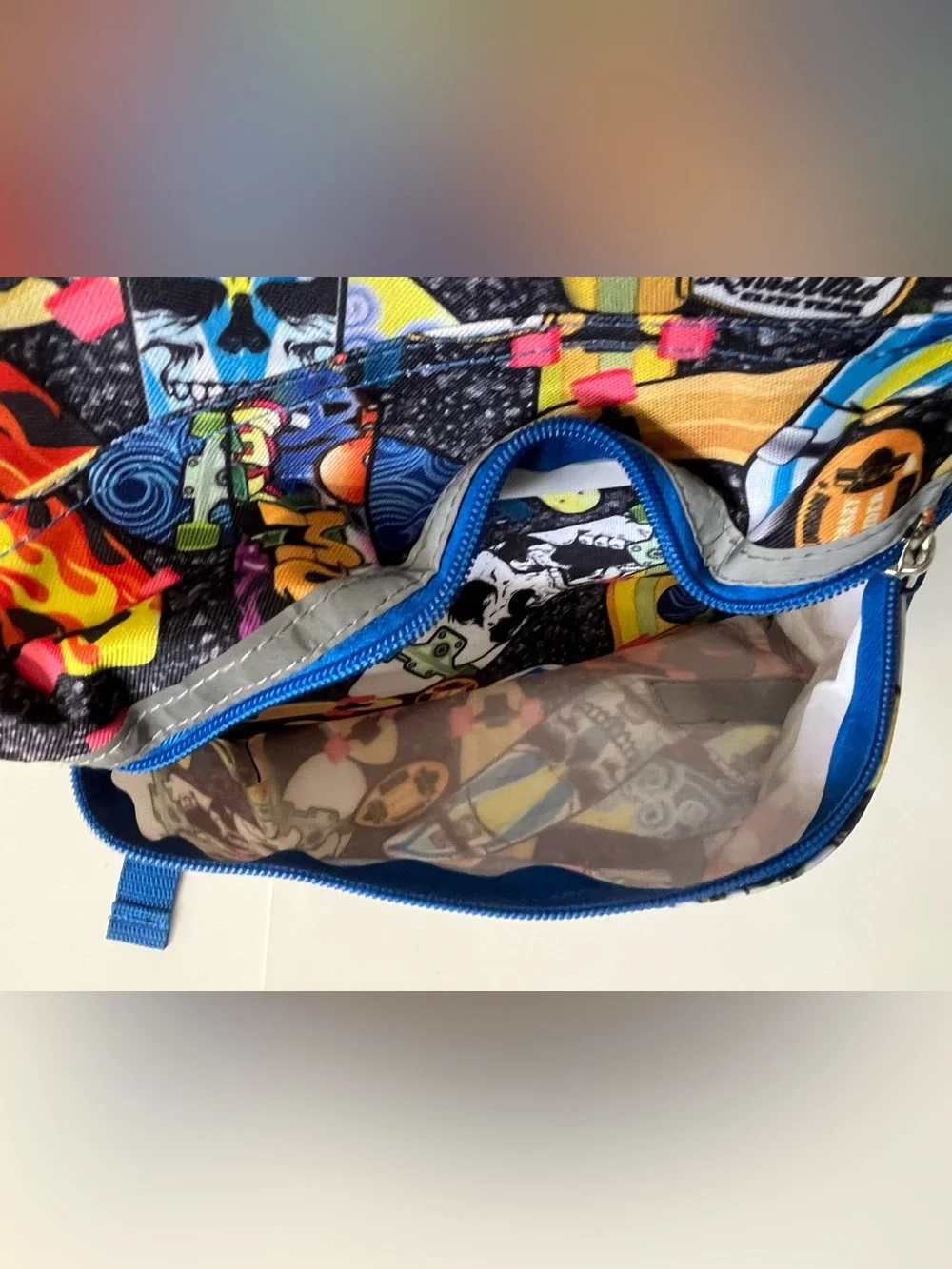 This Reboot Kids Blue Multi-Print Backpack - Fun Skateboard Pattern